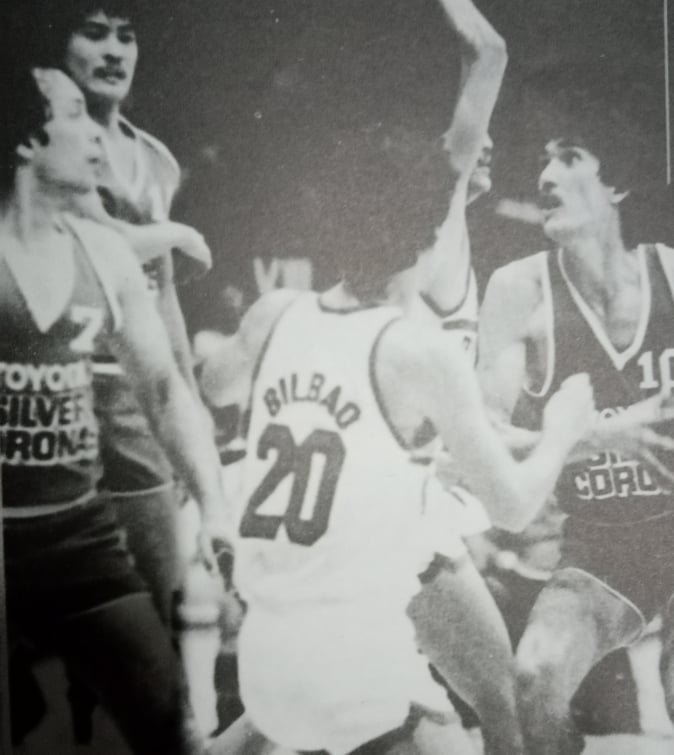 Ramon Fernandez eyes the basket as Toyota mate Sonny Jaworski watches action.