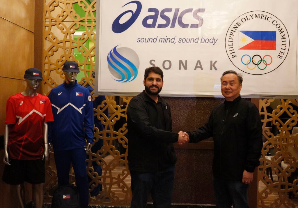 PHILIPPINE Olympic Committee president Rep. Abraham “Bambol” Tolentino and SONAK Chief Technology Officer Kabir Buxani seal the partnership.