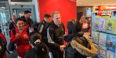 Filipinas coach Alen Stajcic (right) is greeted as the national women's football team arrives at the Dunedin International Airport on the even of their first FIFA Women's World Cup Group A match against Switzerland. [contributed photo]