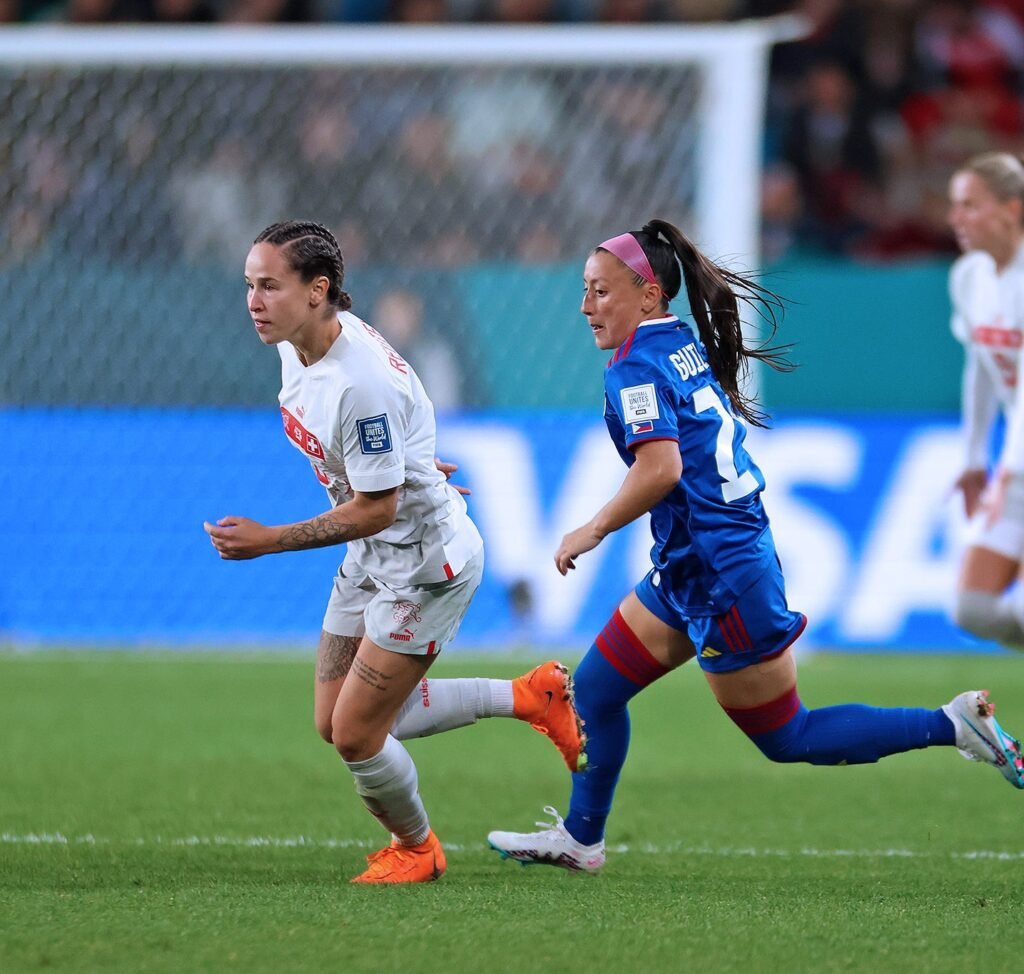 Katrina Guillou (right) stalks a Swiss player. [contributed photo]