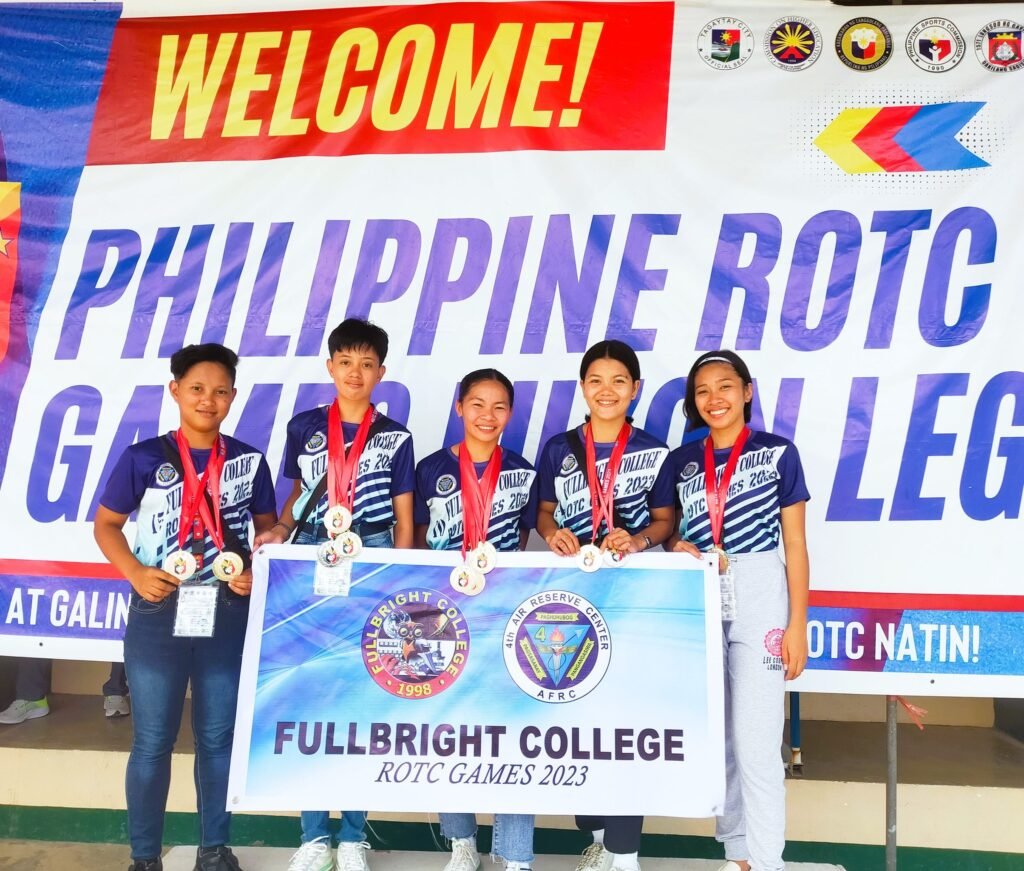 Fullbright College athletes, led by quadruple gold medalist Glyzzel Ann Monsanto, show off their mdeals at the close of the ROTC Games Luzon leg athletic competitions at the Cavite State University track oval. [PSC photo]