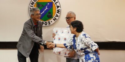 PSC Commissioner Fritz Gaston shakes hand with Palawan Sports Development head Silvany Delight Gastanes as Palawan Provincial Legal Officer Atty. Joshua Bolusa looks on during the FINAL IP Games Technical Working Group meeting. [PSC photo]