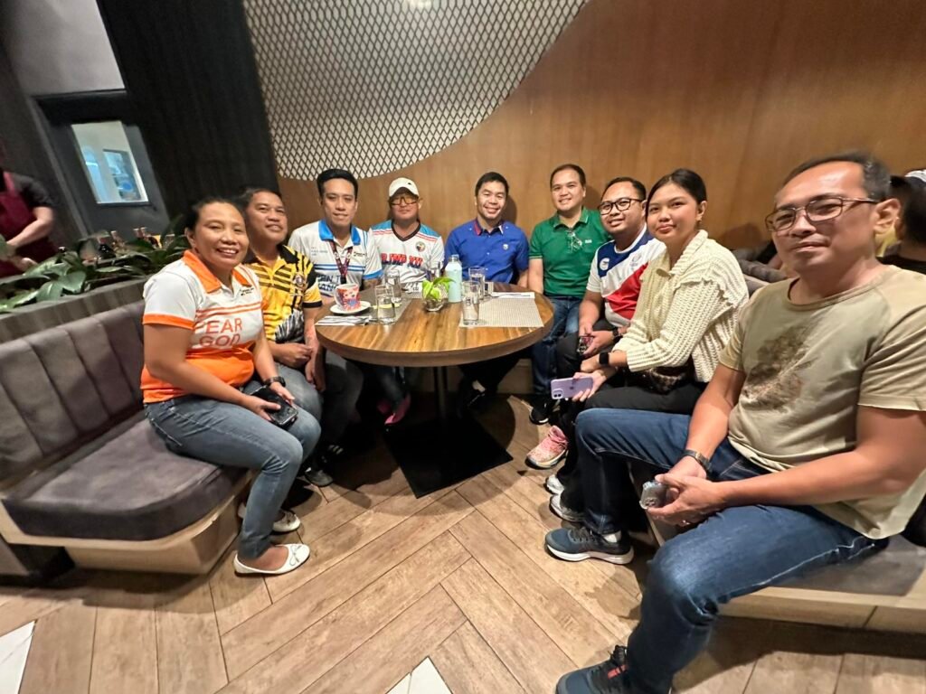 City Sports and Games Development Division Chief Ms. Lady Margaret Manalo of Local Sports Officials of General Santos City together with her staff (Left), Manny Pacquaio, and Office staff of Philippine Sports Commission (PSC) Commissioner Matthew 'Fritz' Gaston (Right).