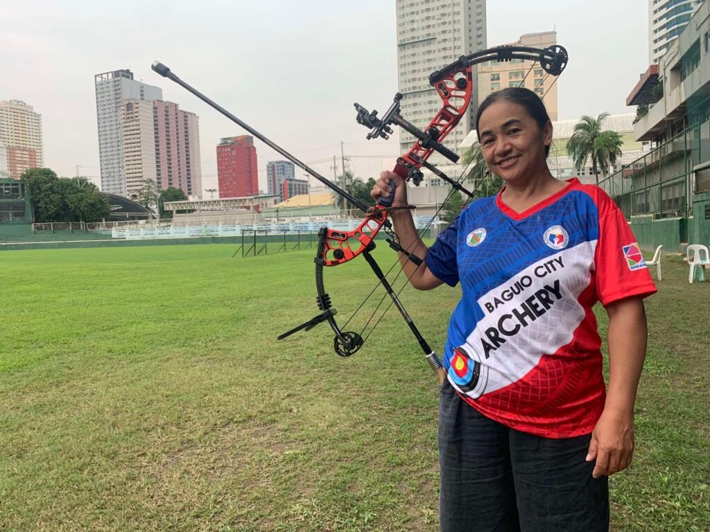 Elizabeth Bayla stands poised, embodying strength and determination after her victorious performance in the women’s compound open division at the 8th Philippine National Para Games. [PSC photo]