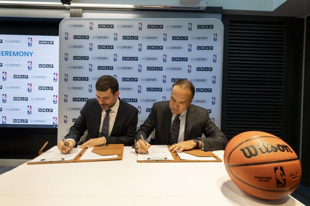 University Mohammed VI Polytechnic (UM6P) President Hicham El Habti and NBA Deputy Commissioner and Chief Operating Officer Mark Tatum at a signing ceremony at UM6P France in Paris (Credit: NBA Africa)