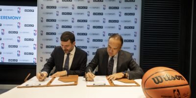 University Mohammed VI Polytechnic (UM6P) President Hicham El Habti and NBA Deputy Commissioner and Chief Operating Officer Mark Tatum at a signing ceremony at UM6P France in Paris (Credit: NBA Africa)