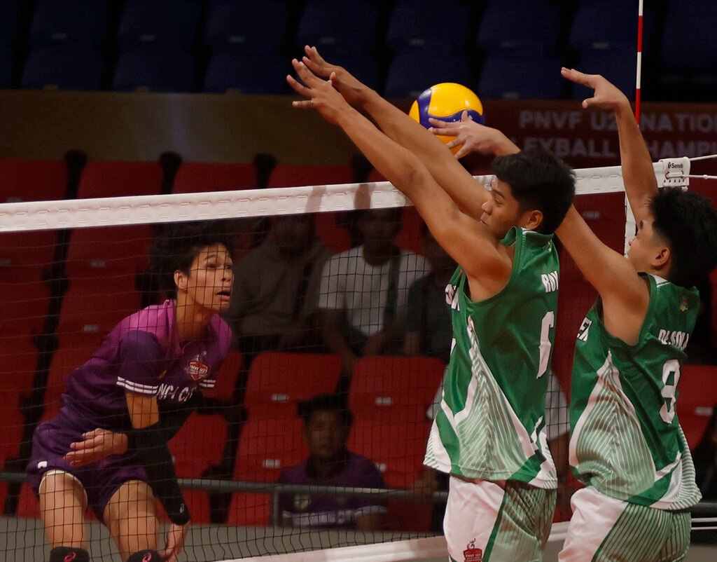 Carl John Nabora of Zamboanga City against defender Van Emhiel Roy (6) and Mark Joseph De Sola (8) of Lingayen [PNVF photo]