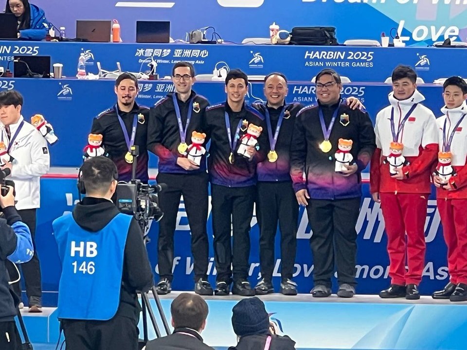 PH Men's Curling Team proudly claimed their hard-earned gold medal during the awarding rites of the Men's Curling event in the 9th Asian Winter Games in Harbin China. [Photo credit: Philippine Sports Commission]