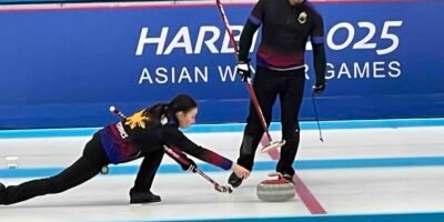 Marc Pfister and Kathleen Dubberstein of team Philippines are gearing up for the competition prior to their battle for bronze against No. 15 China.