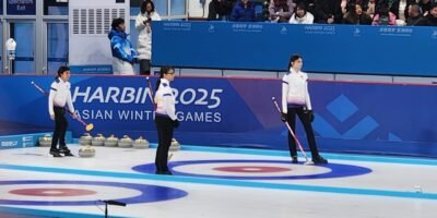 Philippine Women’s Curling team (from left Anne Bonache, Shiela Mariano, and Lani Sumbillo) in action against Japan.