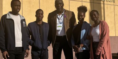 Thompson emphasizes the Olympics’ role beyond medals, calling for sport-driven unity and empowerment. [photo: Youth Charter]