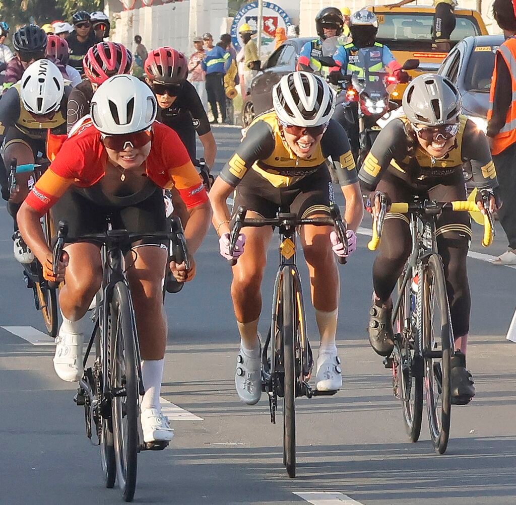 The Women’s Elite Road Race podium finishers: Jermyn Prado (gold), Maritoni Krogg (silver), and Kate Yasmin Aquino (bronze).