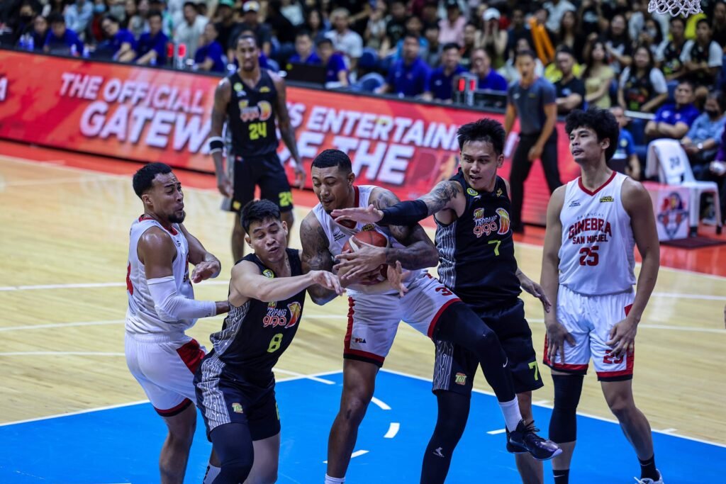 High-stakes PBA action! Barangay Ginebra and TNT Tropang Giga face off in a must-win battle. Who comes out on top? [PBA Images]