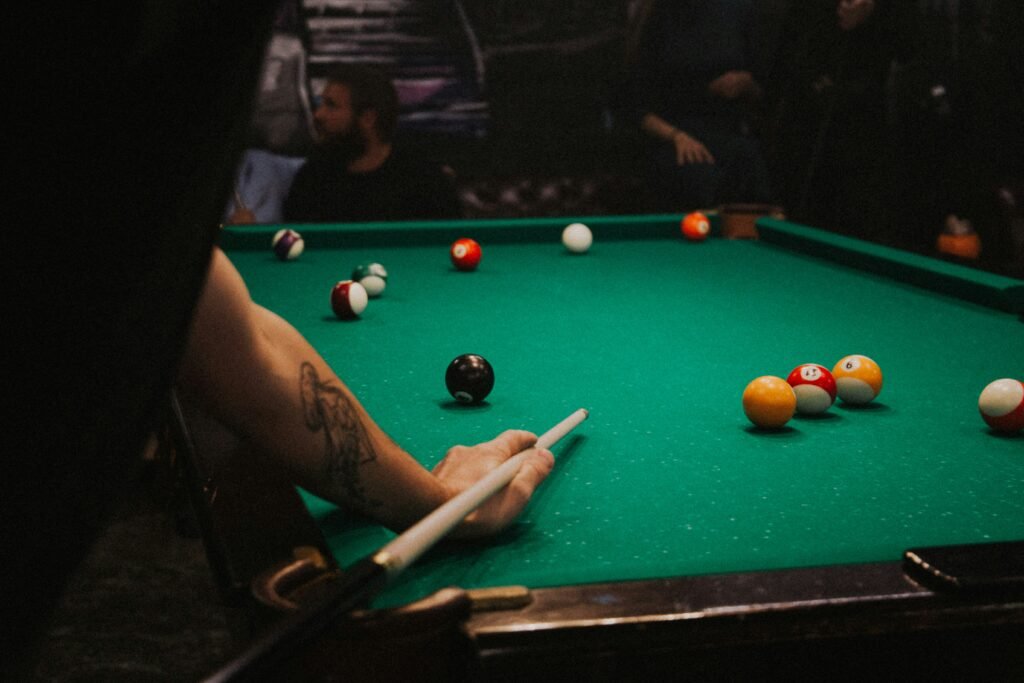 Billiards representation image [Photo by Klara Kulikova on Unsplash]