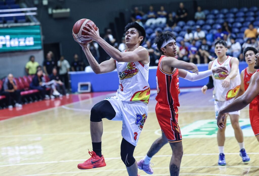 Gian Mamuyac drives past a NorthPort defender during his 22-point performance. [PBA Images]