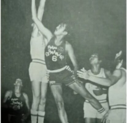 Atoy Co stretches for a layup in a Crispa vs. Toyota duel.