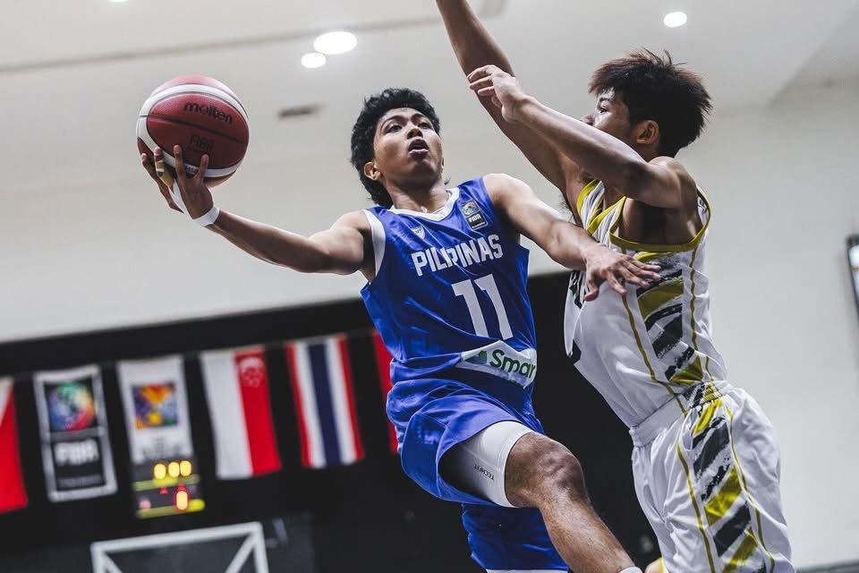 Travis Pascual powers through defenders for a strong finish at the rim [SBP photo]