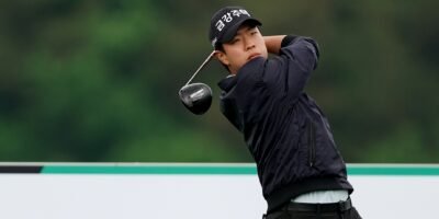 Yujun Jung watches a tee shot during his bogey-free 65 at La Vie Est Belle Golf Club. [photo credit: Korea Golf Association]