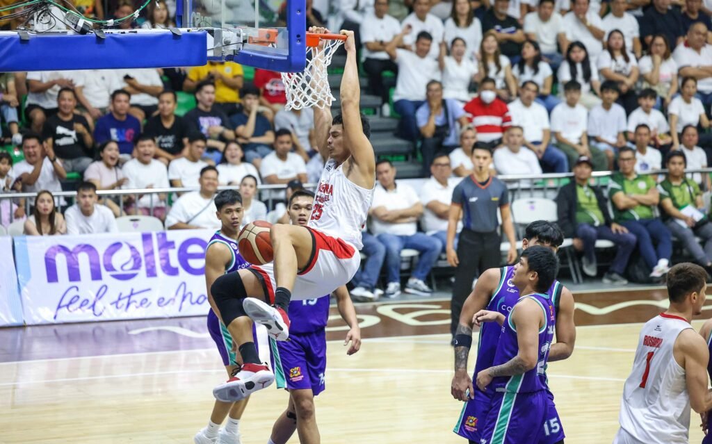 Japeth Aguilar roars after a strong finish at the rim in Ginebra’s win over Converge in Pampanga. [PBA Images]