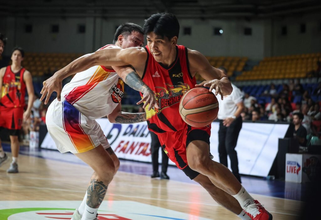 Don Trollano drives past a Phoenix defender. [PBA Images]