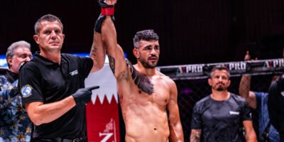 Acoidan Duque celebrates his razor-close win over Jason Ponet at BRAVE CF 95. [BRAVE CF photo]