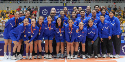 The Alas Pilipinas squad proudly displays their silver medals on the AVC Nations Cup podium [photo credit: AVC Women's Volleyball Nations Cup]