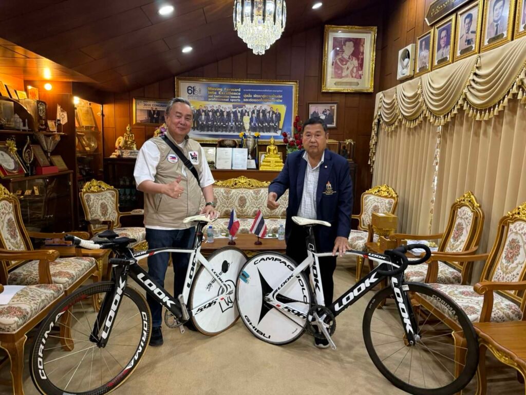 PHILIPPINE Olympic Committee and cycling federation president Abraham “Bambol” Tolentino inspects two bikes of the Thailand cycling association headed by General Decha Hemkasri.