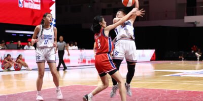 Kong Qian Ya of Hwa Chong drives through the defense in a hard-fought matchup. [photo credit: NBA Rising Stars Invitational]