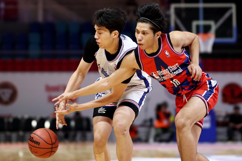 Shaun Lucido of NU-Nazareth led a late rally against Yongsan High School with a game-high 22 points. [photo credit; NBA Rising Stars Invitational]
