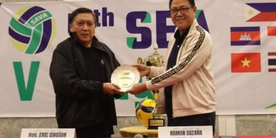 CANDON City Mayor Eric Singson (left) received a volleyball signed by the team captains of the SEA V.League teams from AVC and PNVF president Ramon “Tats” Suzara.