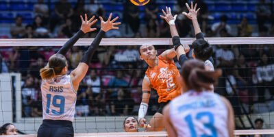 Trisha Tubu powers a hit past two Galeries Tower blockers during Farm Fresh’s sweep. [PVL Images]