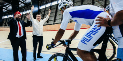 POC and cycling federation president Abraham “Bambol” Tolentino (right) and ACC head Dato’ Amarjit Singh Gill flag off veteran Ronald Oranza during the inauguration of the Tagaytay City Velodrome last June 23.