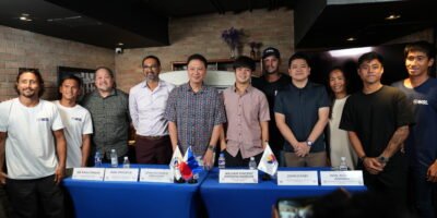 PSC chairman Patrick Gregorio with event officials at the PSA Forum in Makati.