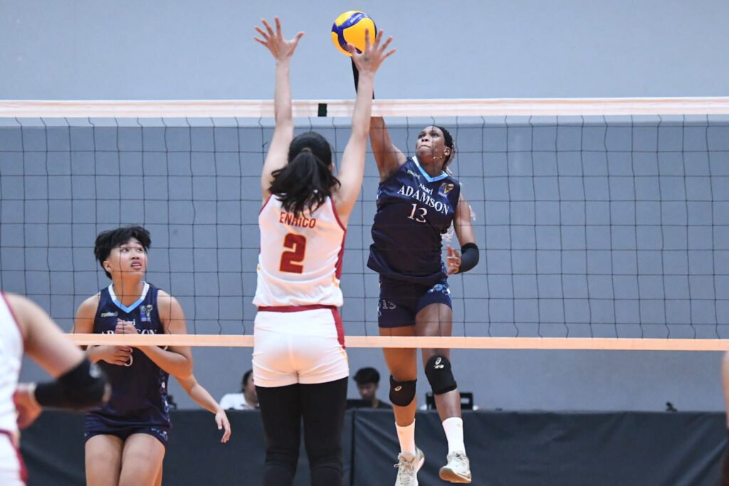Adamson’s Frances Mordi powers through Perpetual’s blockers during their V-League match. [PVL Images]