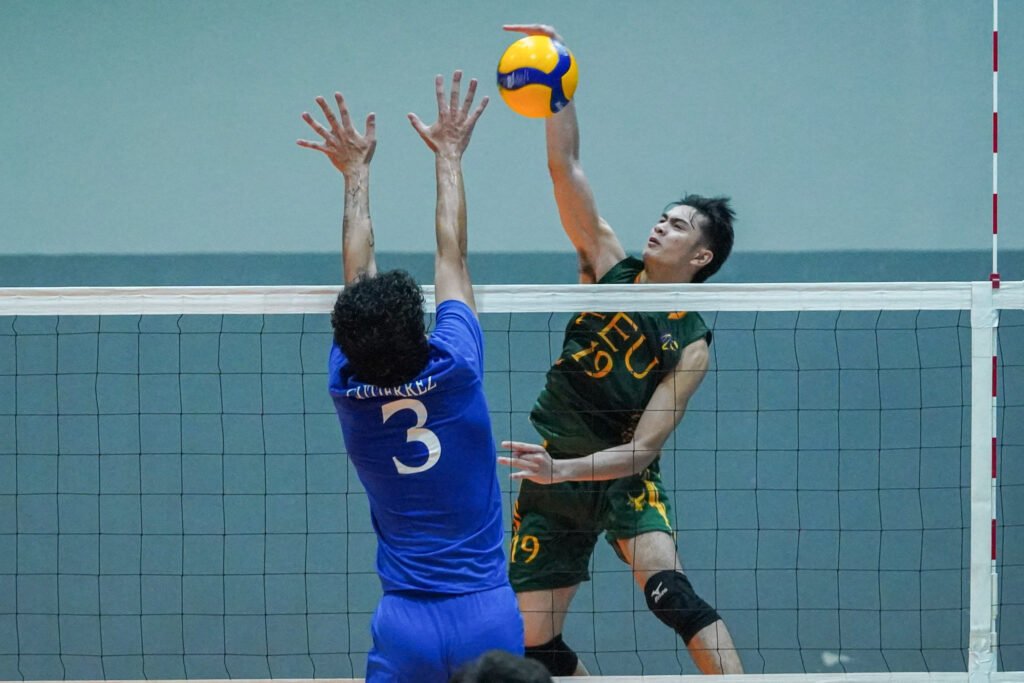 FEU’s Amet Bituin fires a kill against Ateneo’s defense in the V-League Collegiate Challenge 2025. [PVL Images]