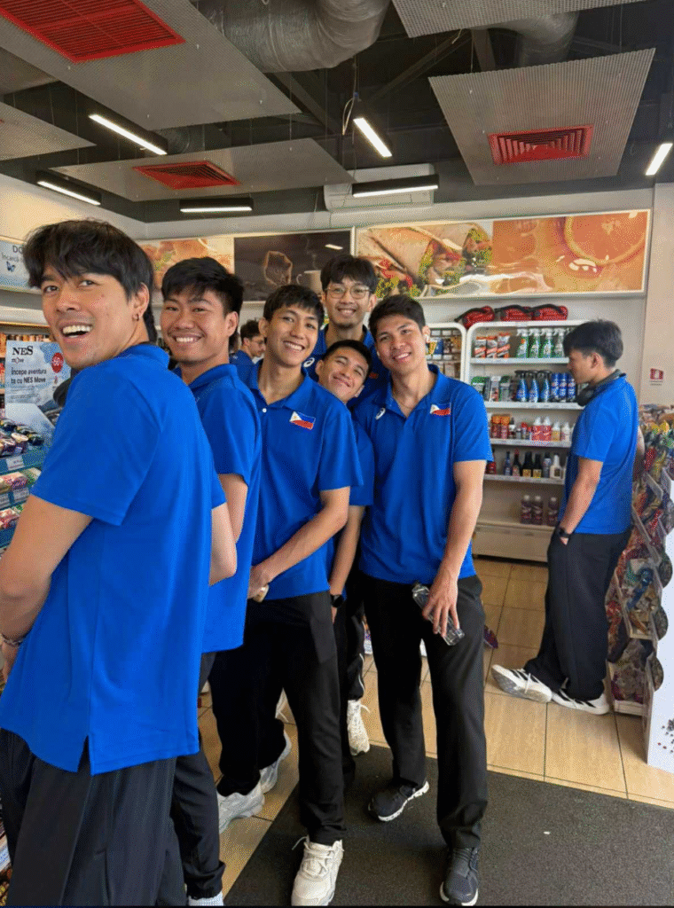 MARCK ESPEJO (sixth from left) and teammates (from left) Bryan Bagunas, Louie Ramirez, Lloyd Josafat, Vince Lorenzo, Peng Taguibolos and Jade Disquitado, who looks undecided as he looks at the rack, get some snacks during a brief stopover in the five-hour bus ride that took them from the city of Piatra Neamt to Romania’s capital Bucharest to take a flight for Portugal during the weekend. [photo credit: PNVF Communications]