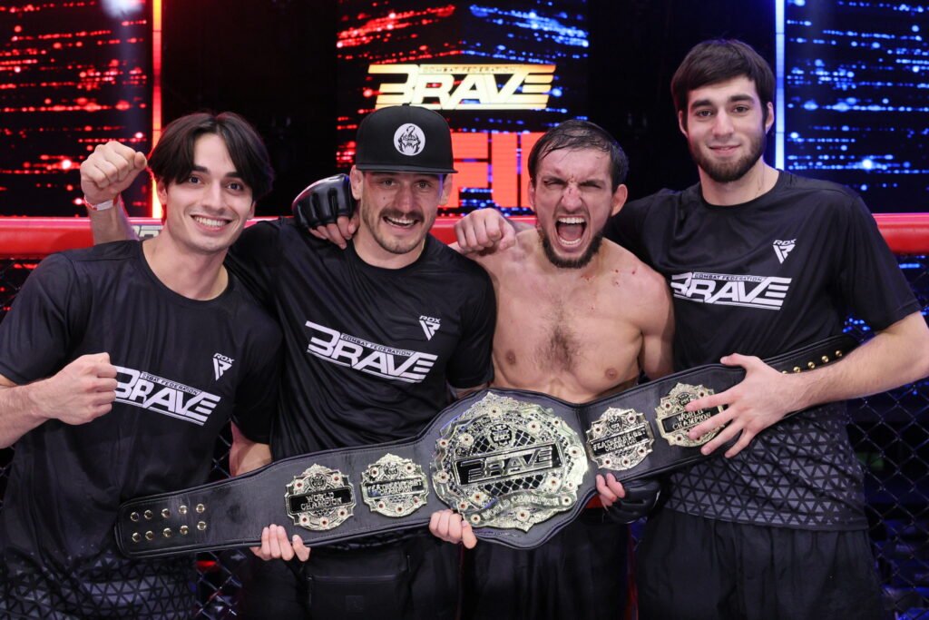 Omar Solomanov with the interim featherweight belt after his win at BRAVE CF 98.