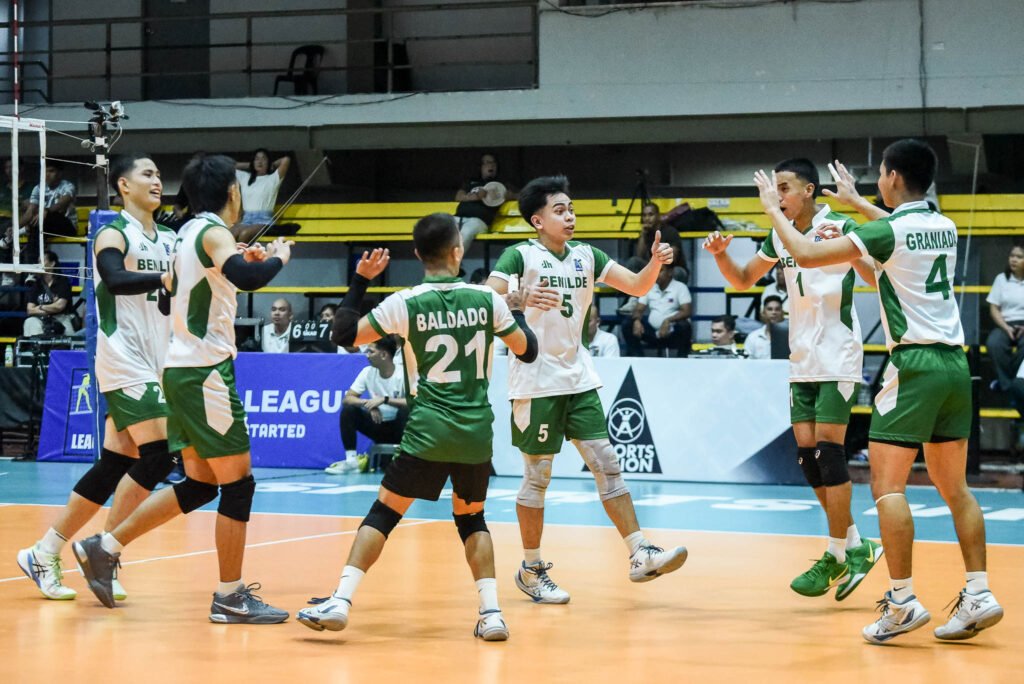 Benilde players celebrate their stunning five-set win over FEU. [PVL Images]