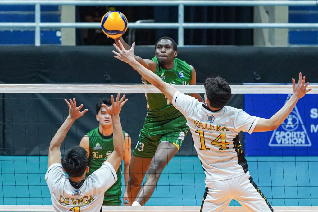 Issa Ousseini dominates at the net with seven blocks for the Green Spikers. [PVL Images]