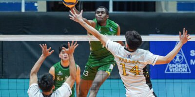 Issa Ousseini dominates at the net with seven blocks for the Green Spikers. [PVL Images]