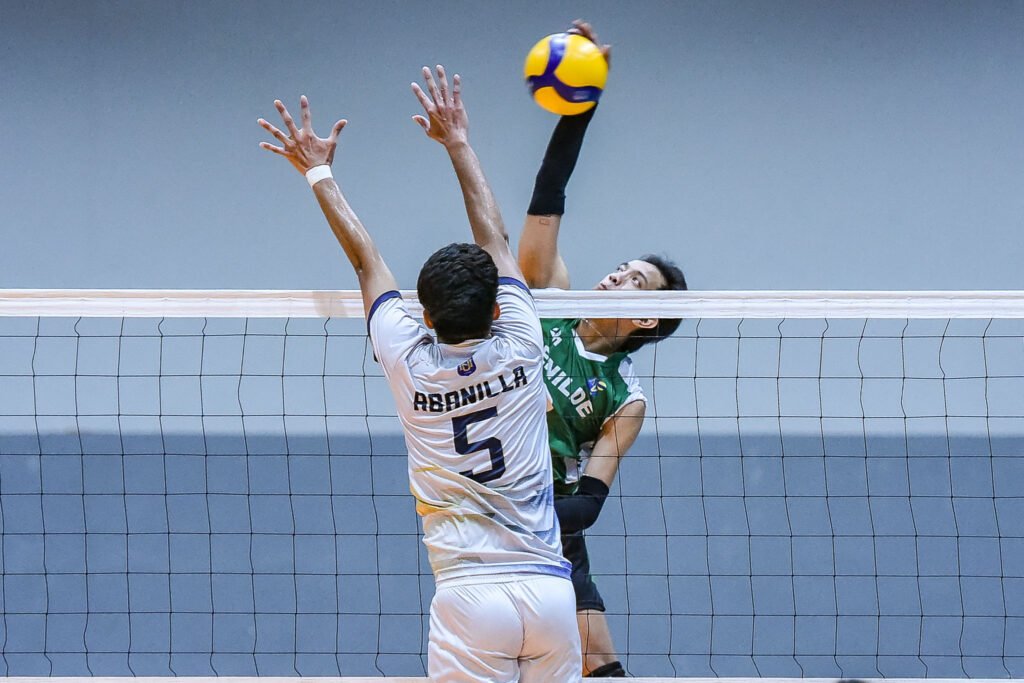 Benilde’s Rocky Motol rises for a hit against NU. [PVL Images]