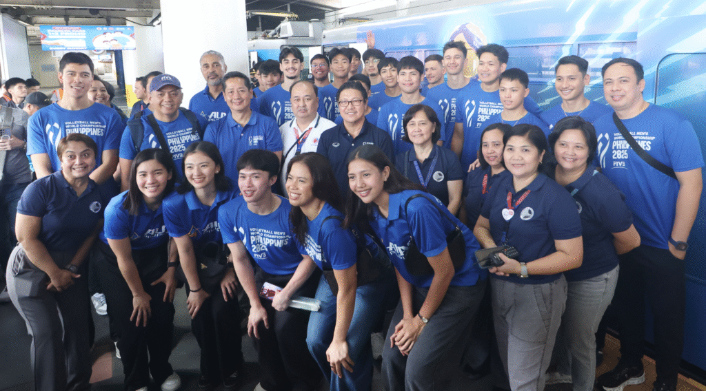 Members of Alas Pilipinas Men and Women along with PNVF president Ramon “Tats” Suzara, secretary-general Don Caringal and board member Yul Benosa and MRT3 General Manager Michael Capati pose before a fully dressed up MRT 3 train at the North Edsa station. [PNVF Photo]