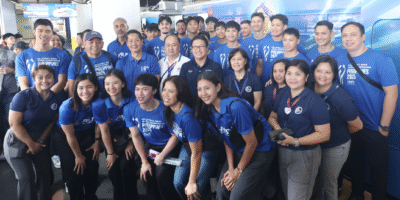 Members of Alas Pilipinas Men and Women along with PNVF president Ramon “Tats” Suzara, secretary-general Don Caringal and board member Yul Benosa and MRT3 General Manager Michael Capati pose before a fully dressed up MRT 3 train at the North Edsa station. [PNVF Photo]