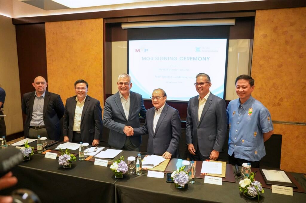Ayala Foundation, Inc. Chairman Jaime Augusto Zobel de Ayala (third from left) and MVP Sports Foundation, Inc. Chairman Manuel V. Pangilinan (fourth from left) forge a landmark partnership uniting their two powerhouse institutions in a shared mission to uplift Filipino communities through sports excellence during Monday’s MOU signing at the Fairmont Hotel in Makati City.