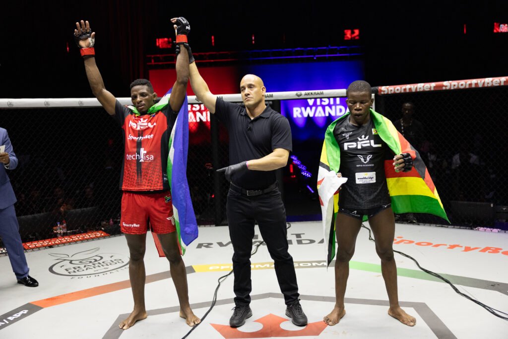 Nkosi Ndebele celebrates his split decision win in Kigali. [PFL photo]