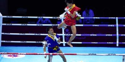 Jan Brix Ramiscal (red) and Tyron Jamborillo (blue) rule the Mixed Team Mai Muay. [POC photo]