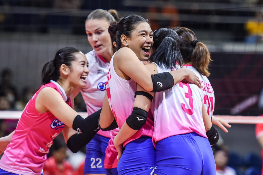 Creamline players erupt in celebration after sealing the match inside the Big Dome. [PVL Images]