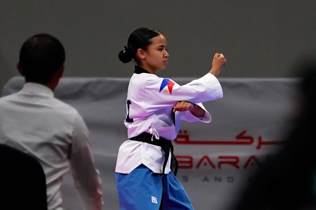 Kristen Ambriel Aguila displays form during her silver-medal poomsae performance in Bahrain. [POC photo]