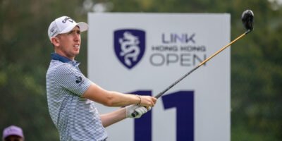 Tom McKibbin tees off during the second round at Hong Kong Golf Club as he maintains his lead. [Asian Tour photo]