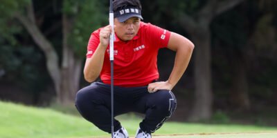 Hung Chien-yao lines up a putt en route to a sizzling 65 at Taifong Golf Club. [Asian Tour photo]